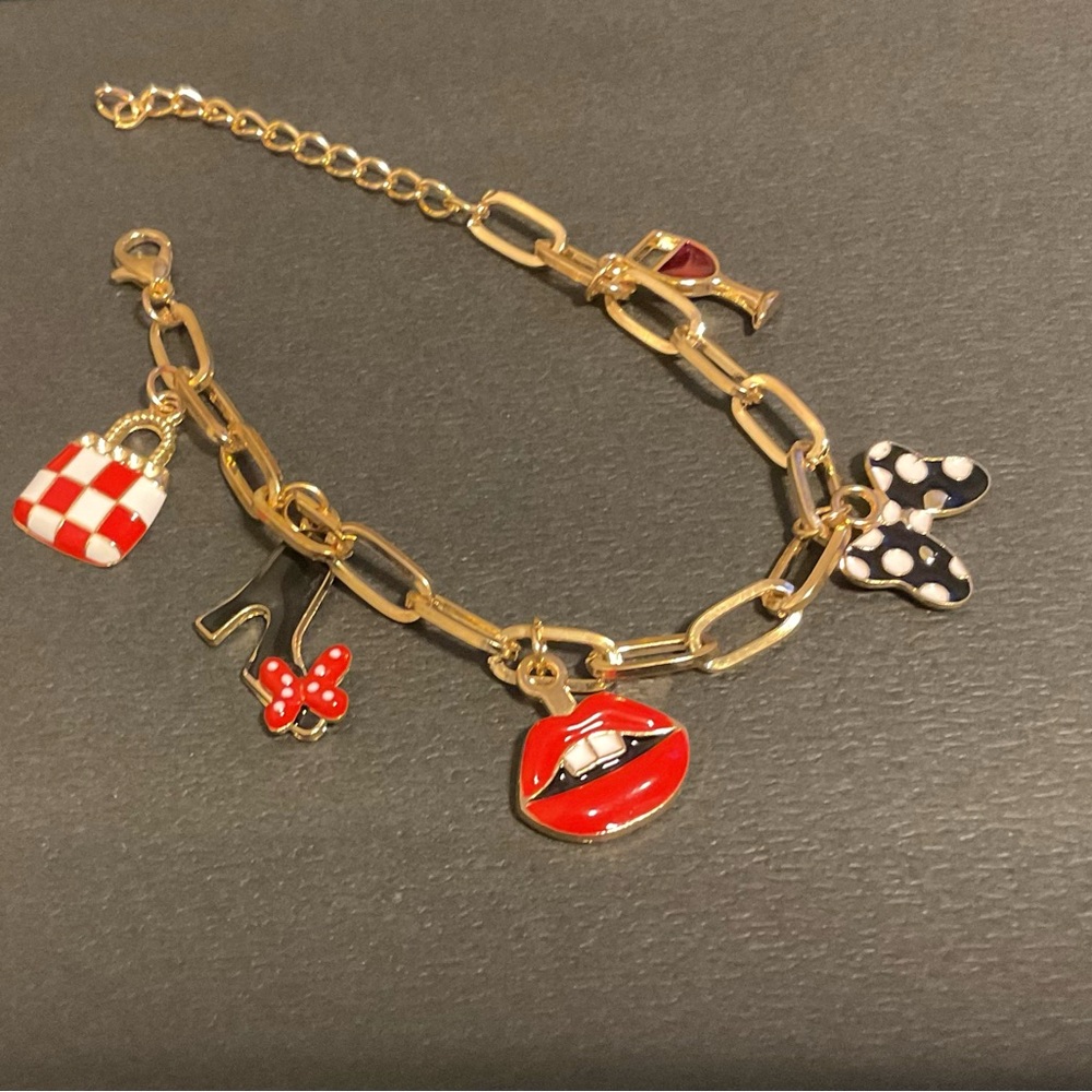 Custom-made charm bracelet with whimsical loop shoes and bags!